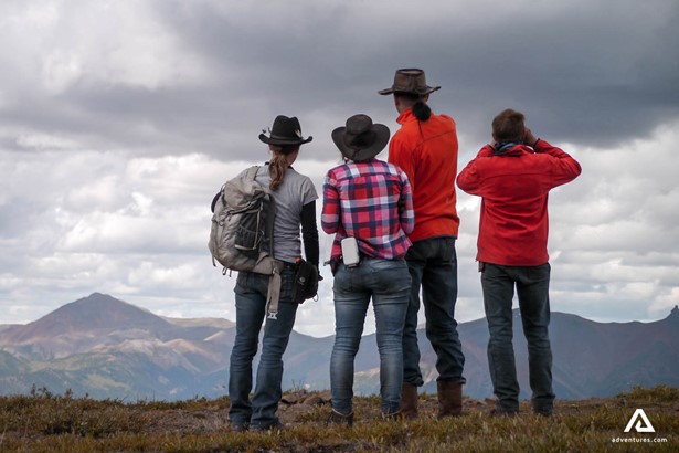 A group of tourists enjoying mountain view