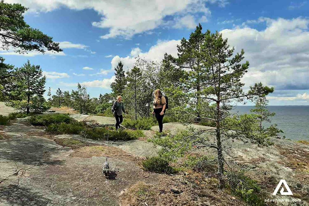 walking a small dog in porkkala finland