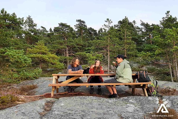 sitting at a camping table in porkkala area