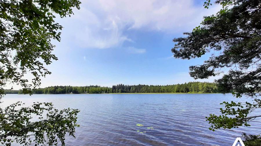 sunny lakeside view in finland