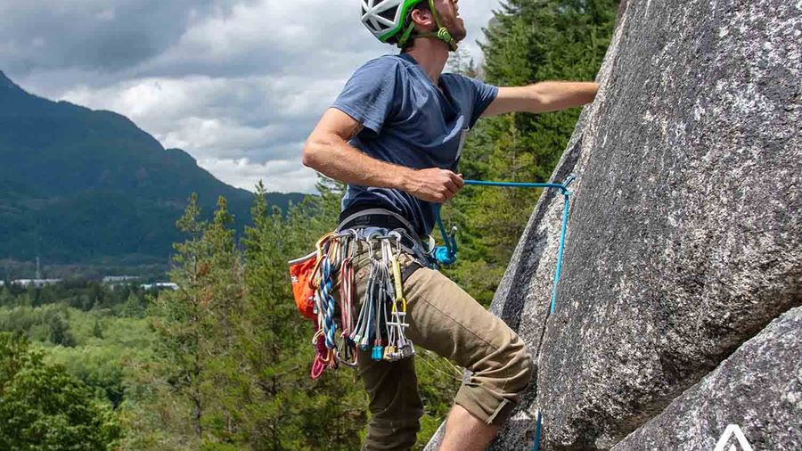 Man Rock Climbing Steep Cliff Whistler