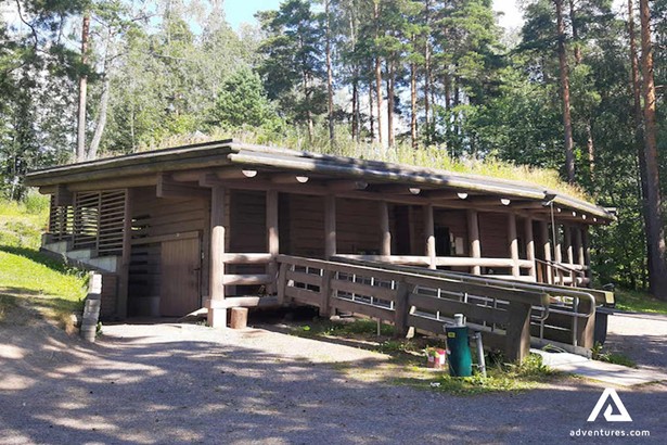finnish smoke sauna with a turf roof in finland
