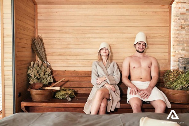 two friends enjoying sauna spa