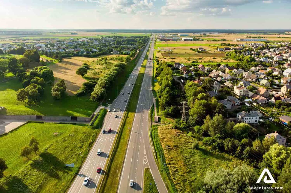 highway road with cars in lithuania on a summer day