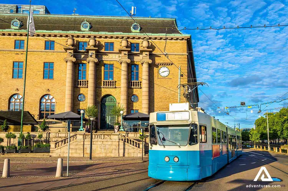 blue tram train in the streets of gothernburg in sweden