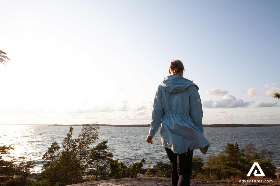 woman talking toward the seaside in Porkkalanniemi