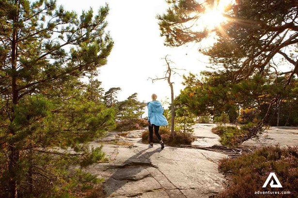 woman hiking around Porkkalanniemi Archipelago in finland