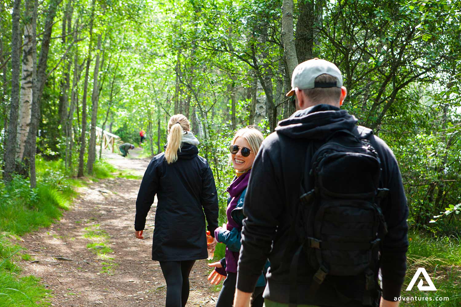 hiking in a forest in finland at summer