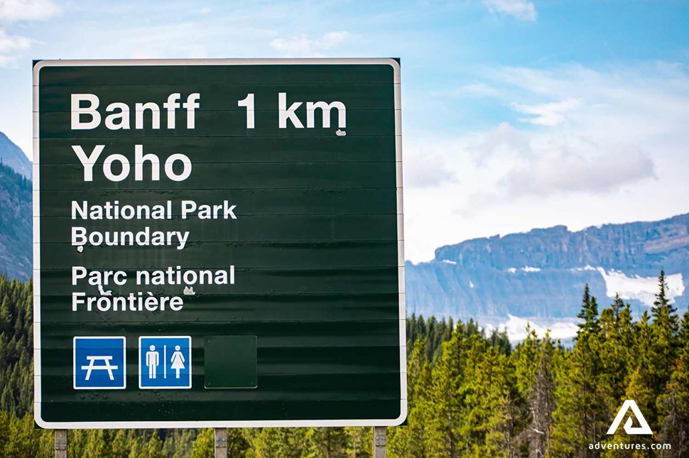a large road sign near banff national park