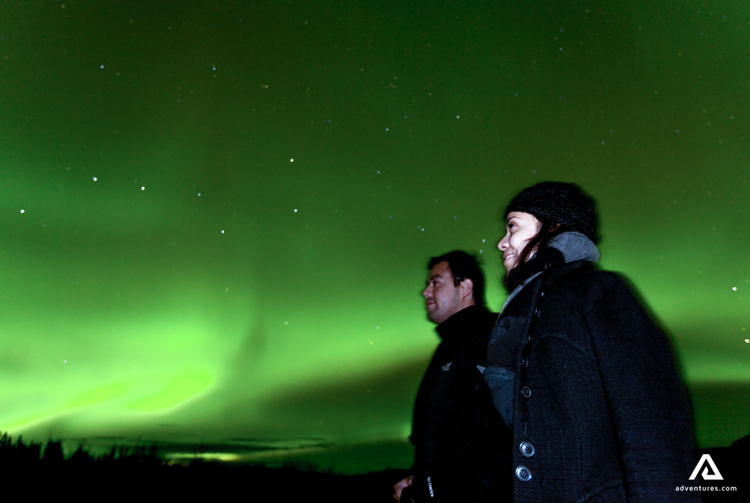 Couple enjoying green sky view