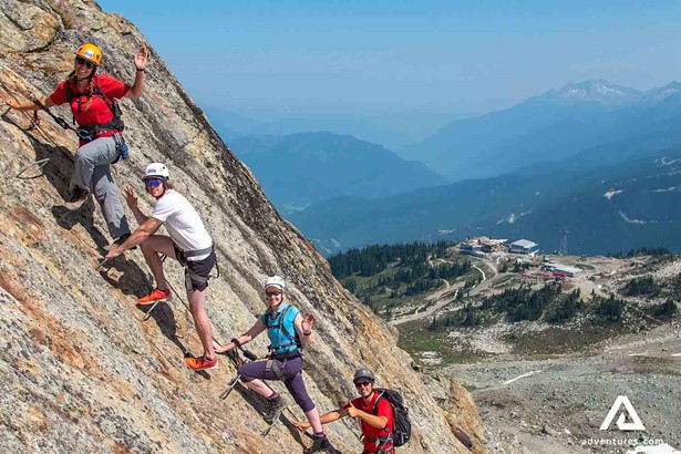group rock climbing via ferrata in canada