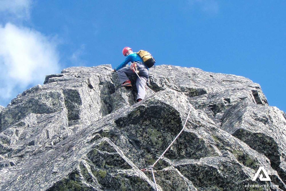 rock climber high above ground