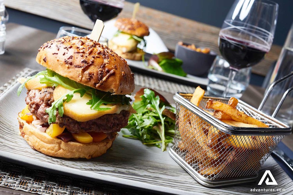 a burger and fries meal on a plate