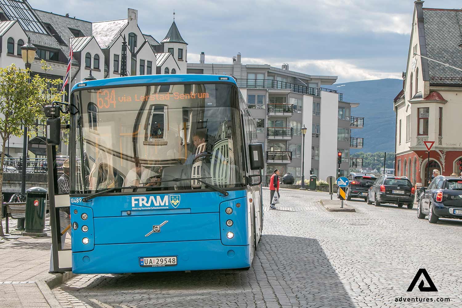 a blue public transport bus in alesund