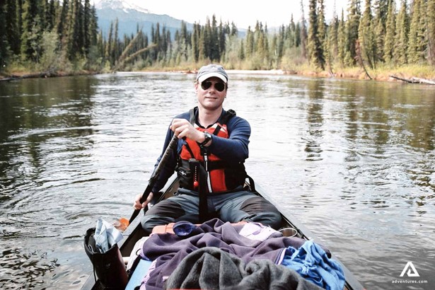 Man canoeing on Teslin River 