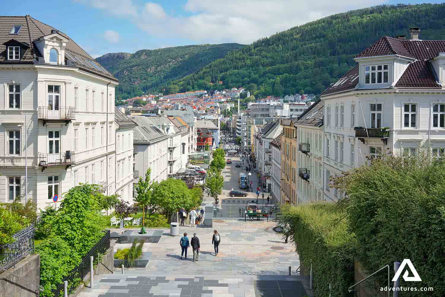 people walking down a street in bergen norway