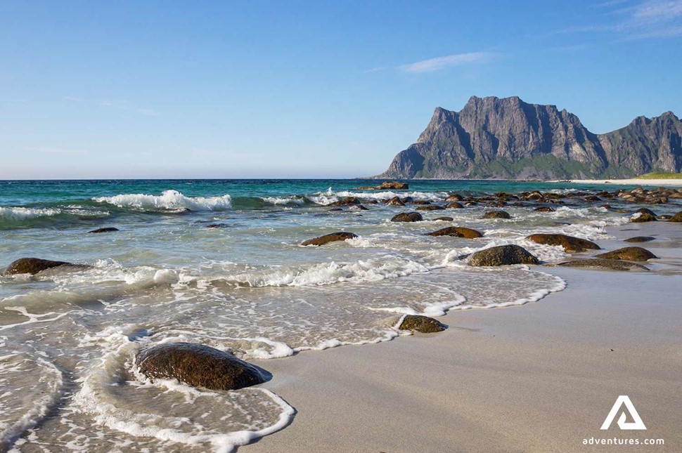 clear water waves at uttakleiv beach near lofoten in norway