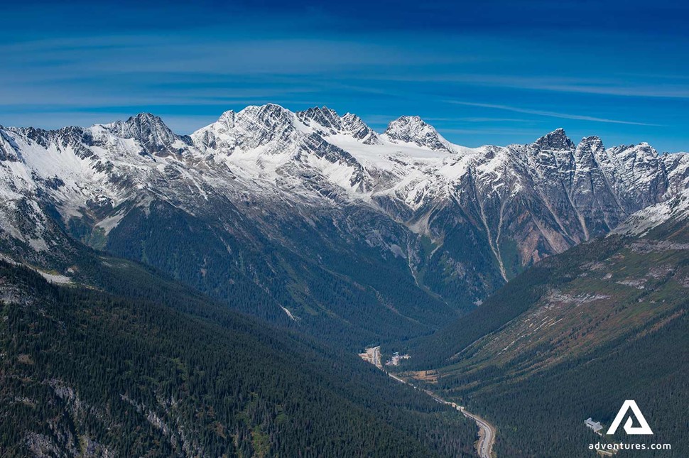 high above mountains near roger pass historic site in canada