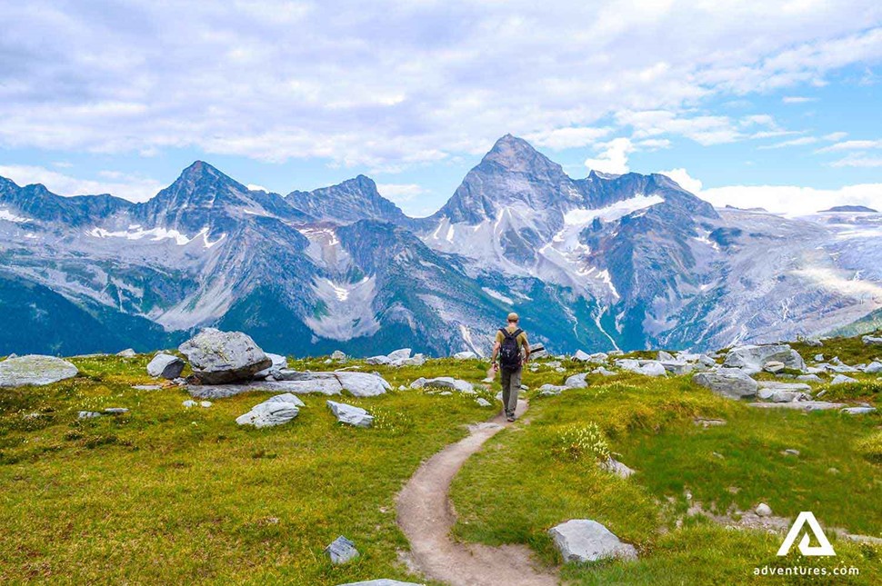 man hiking mount sir donald in canadian glacier national park