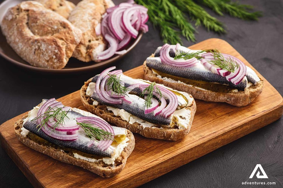 salted herring on a sandwich swedish food