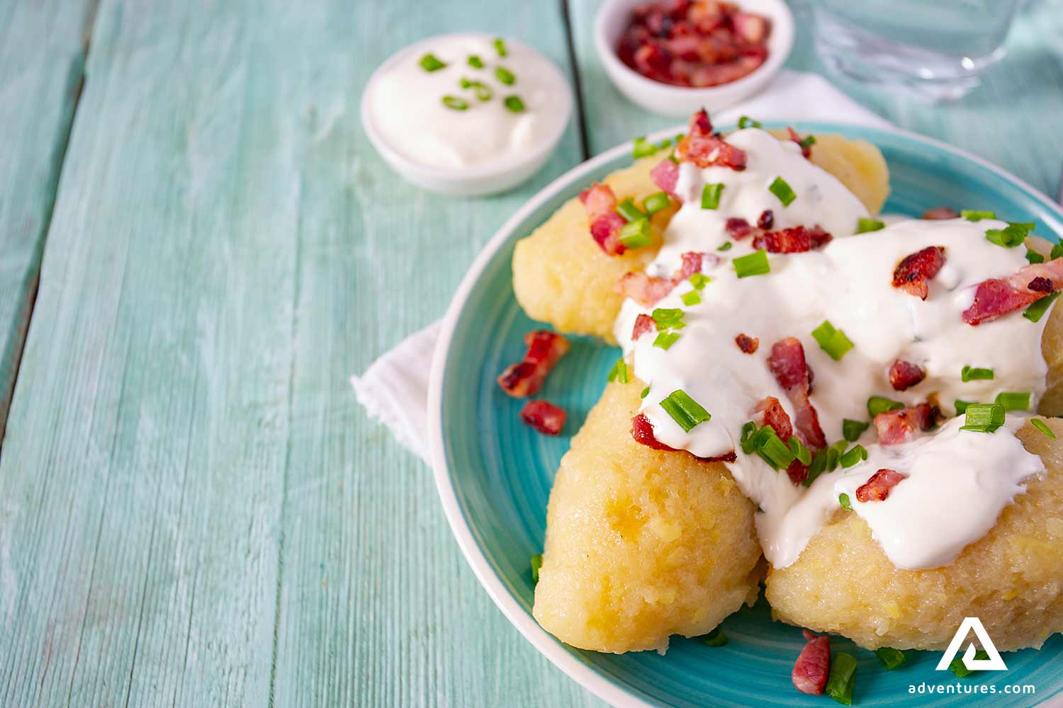 lithuanian potato dish cepelinai with sour cream