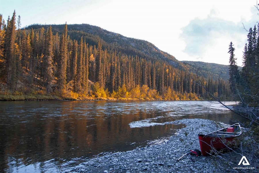 Canoeing on a Big Salmon River at sunset