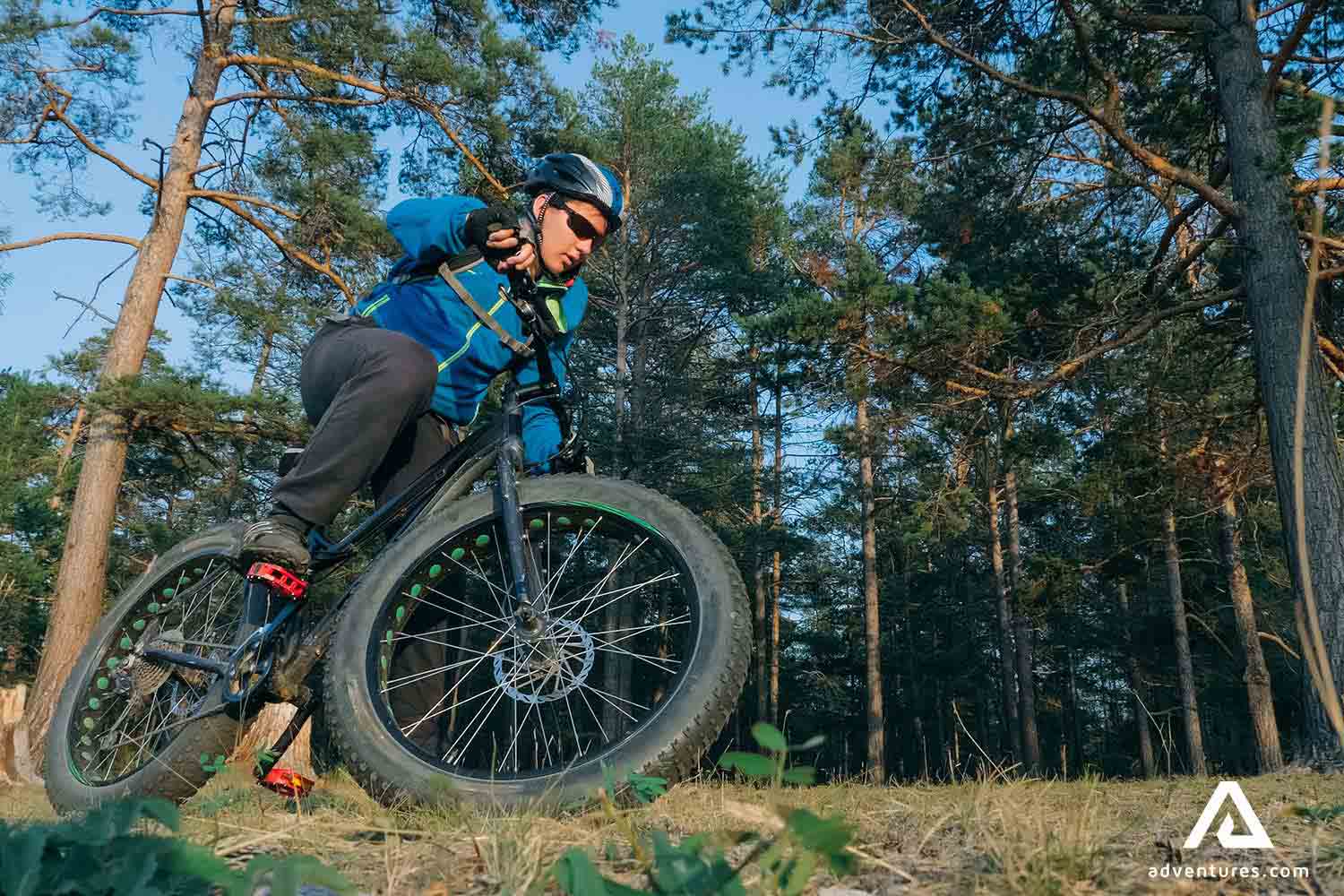 man riding a fat bike in finland