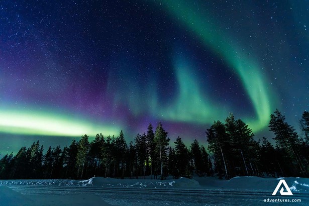 purple and green aurora borealis in finland