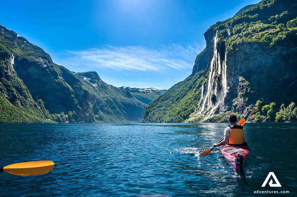 kayaking on a sunny day in a fjord in norway