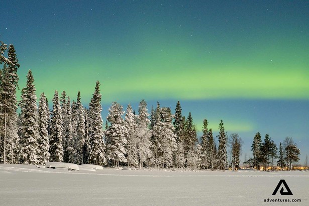 northern lights above lake pyhajarvi in finland