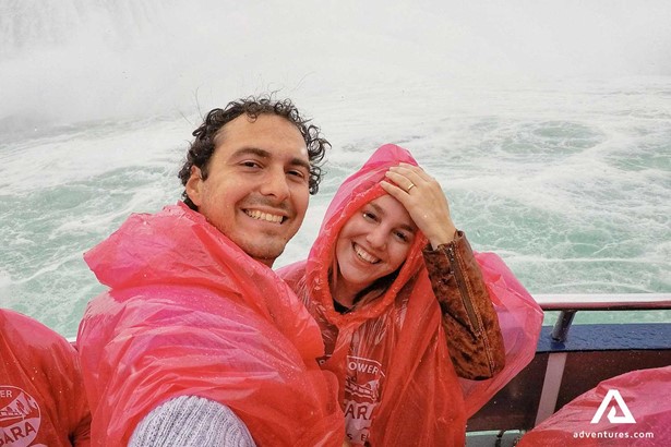 Happy Couple Selfie with raincoats