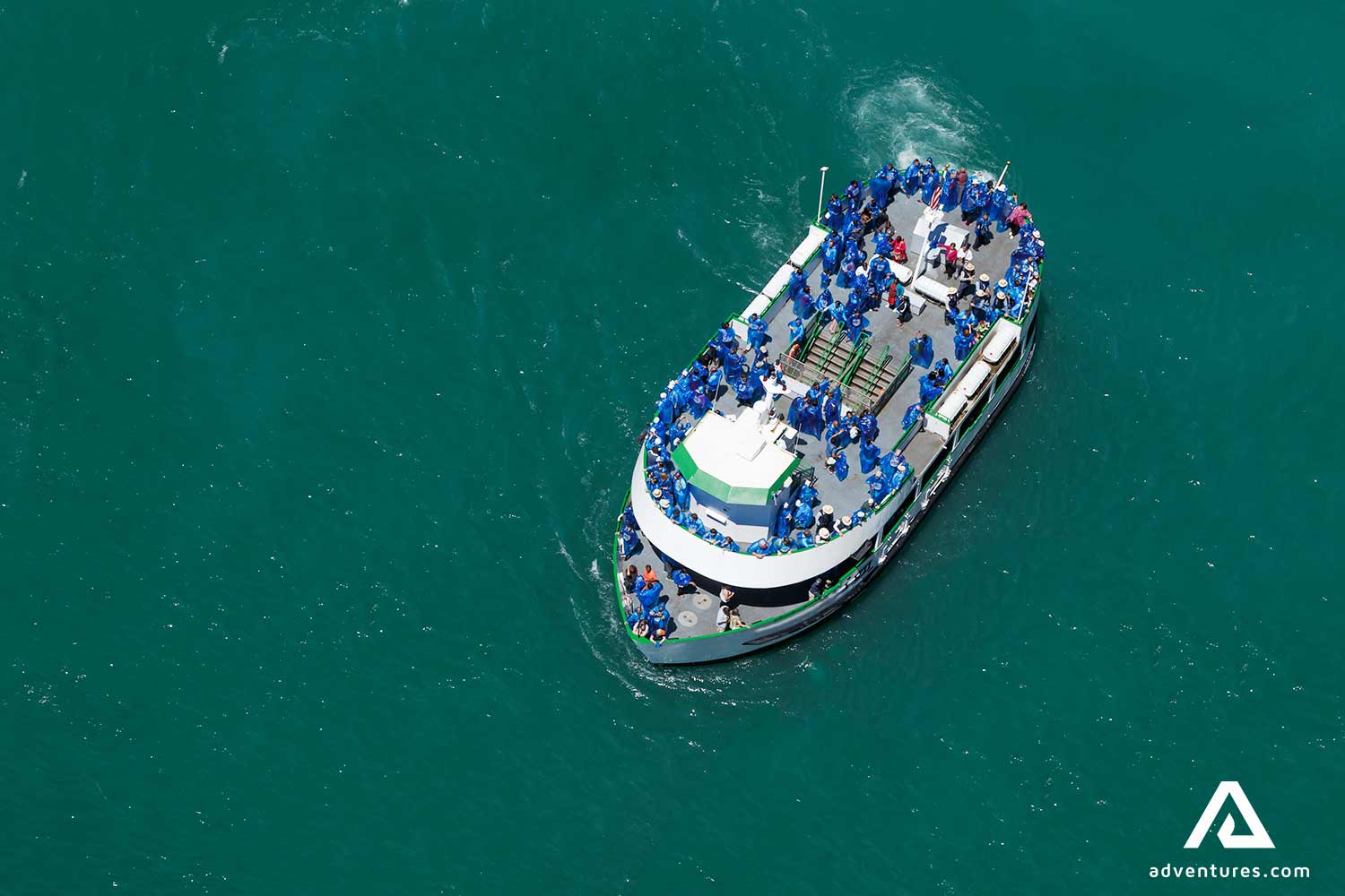 Blue Raincoat Dressed Group in a boat