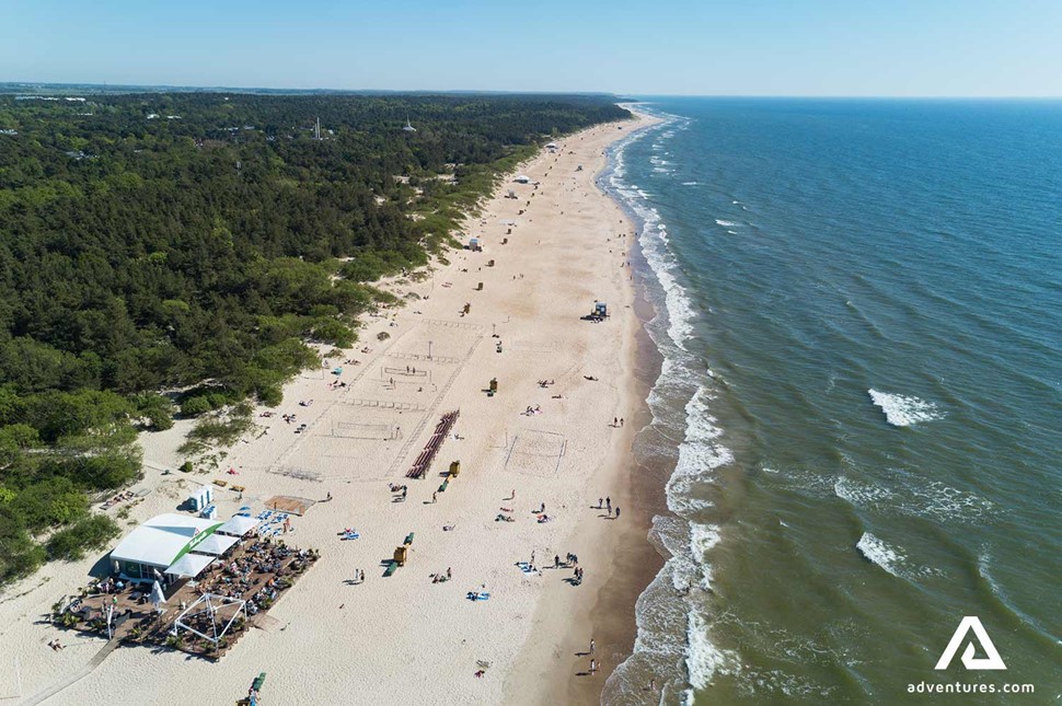 aerial drone view above a beach in palanga and baltic sea