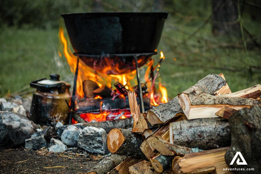 large pot on a campfire
