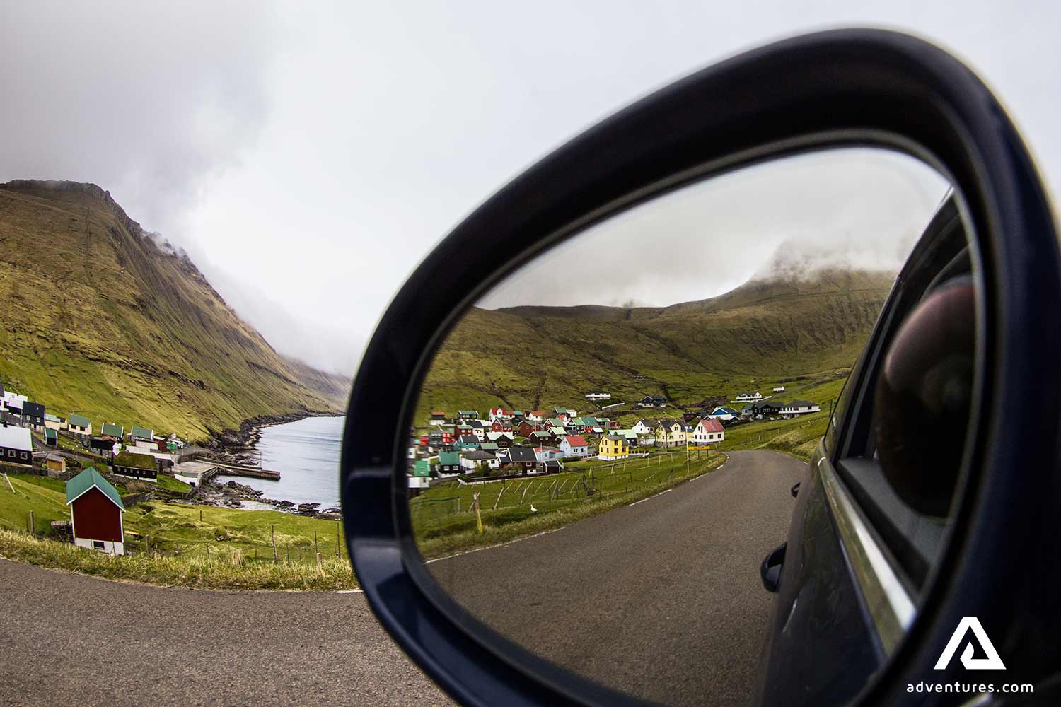 car mirror view while driving in faroe islands