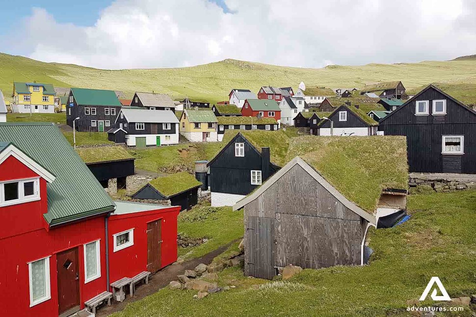 colorful houses with turf roofs in mykines