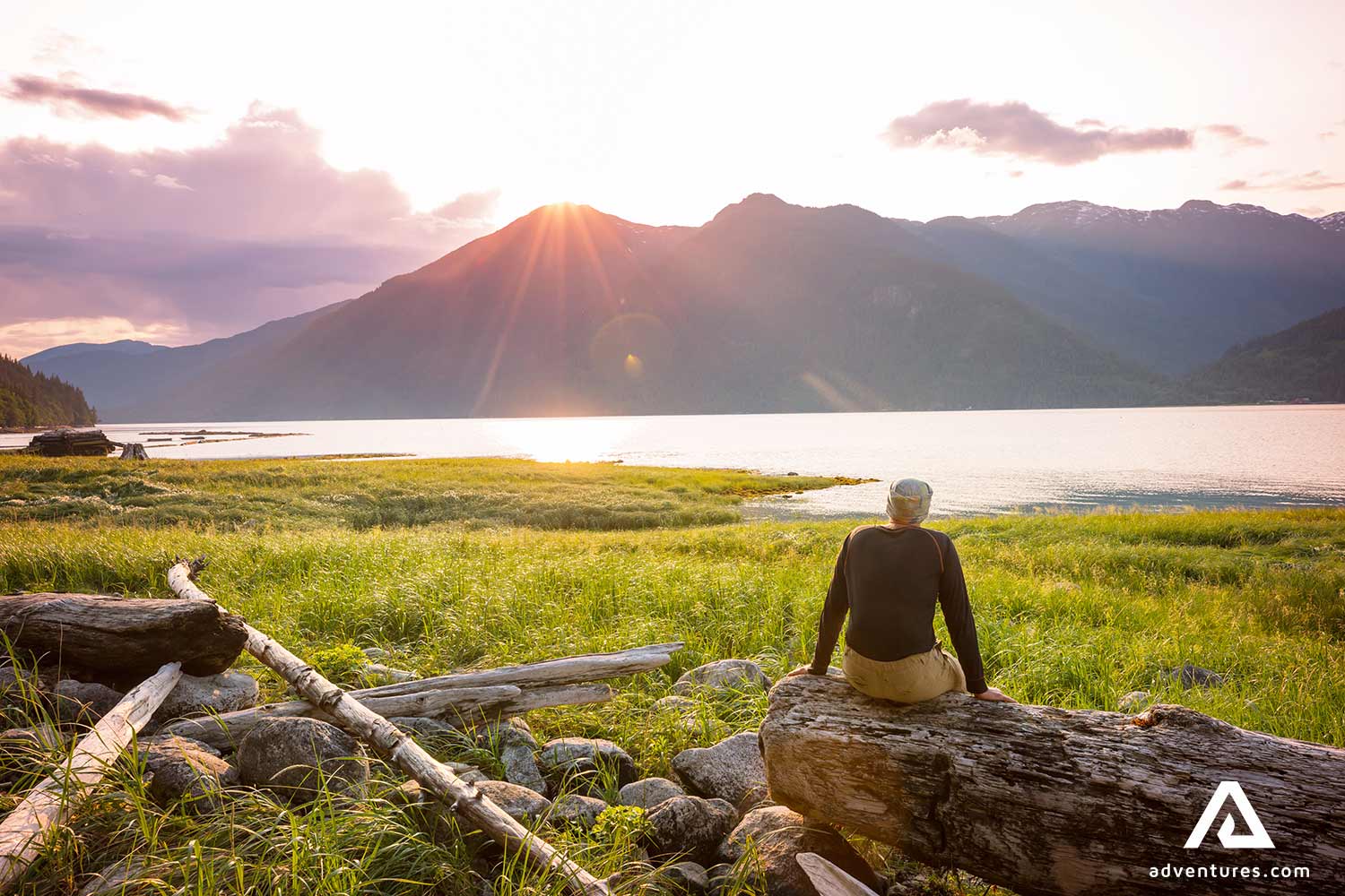 Man Sitting On Tree Wooden Log resting