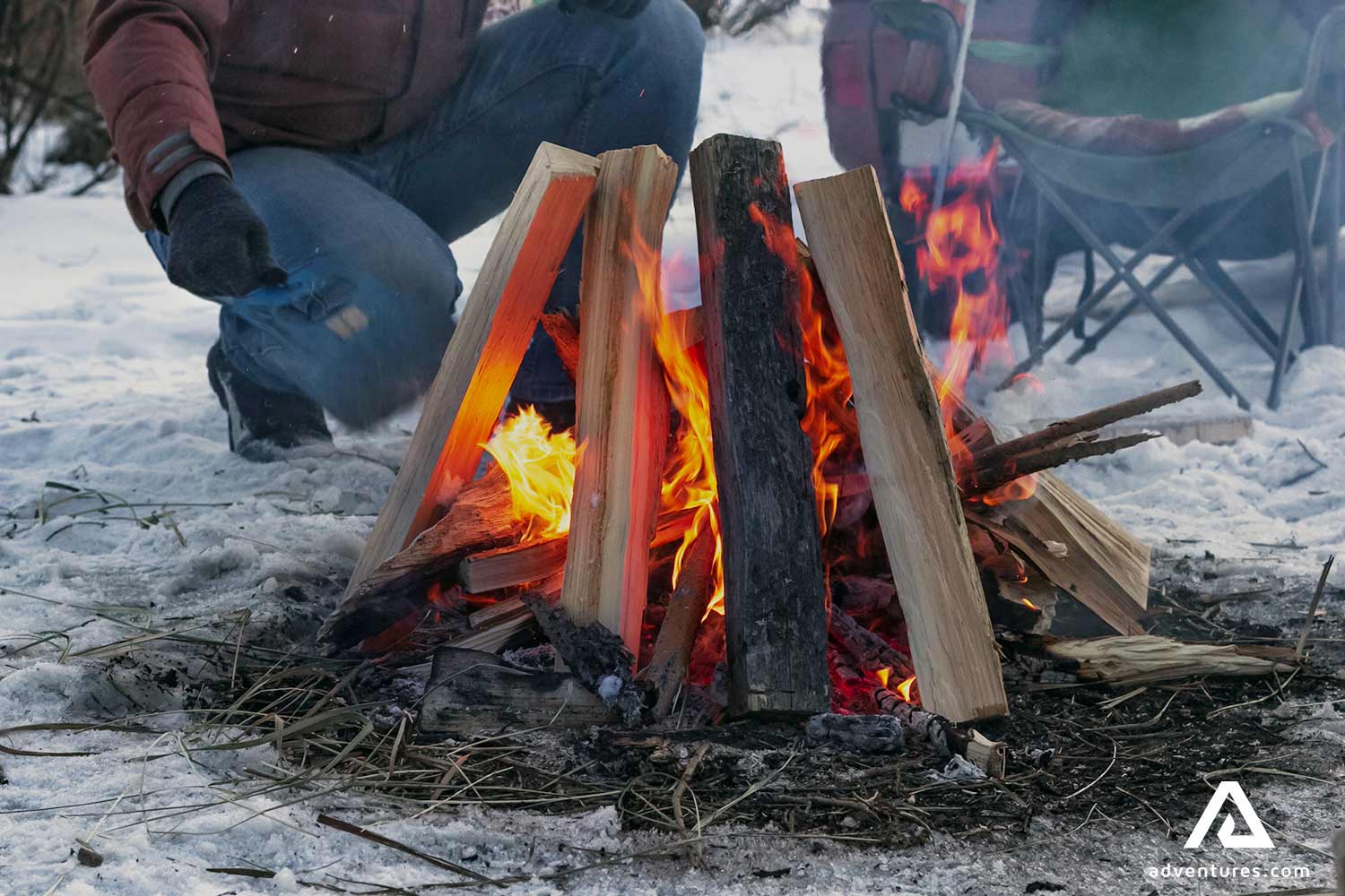 campfire in winter forest in finland