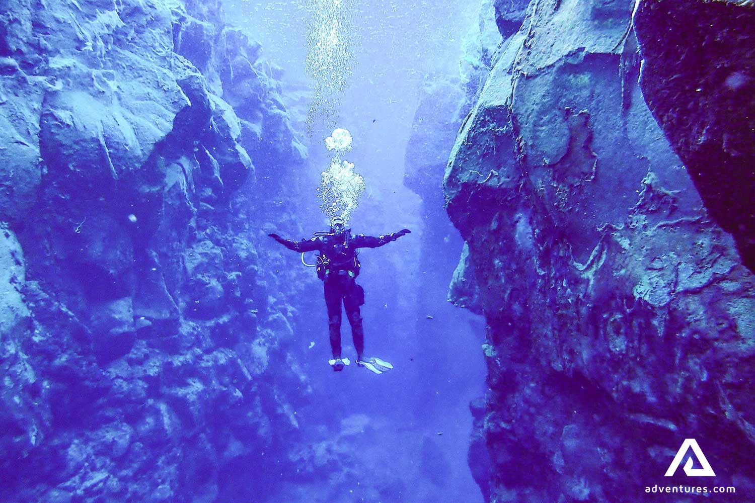 scuba diver posing for a picture in silfra