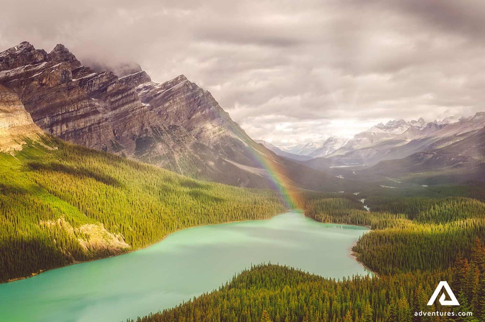 rainbow over canadian rockies in banff national park in canada