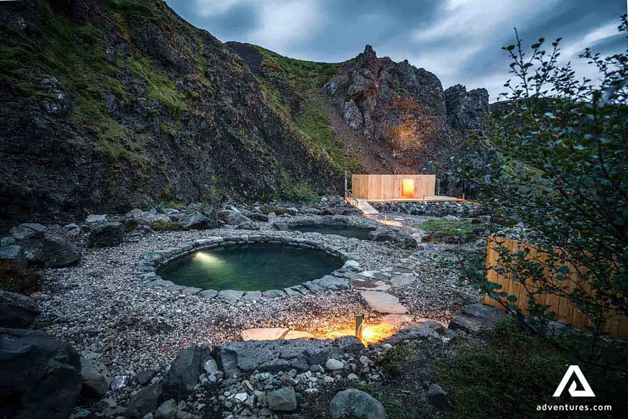view of a geothermal bath in the evening 
