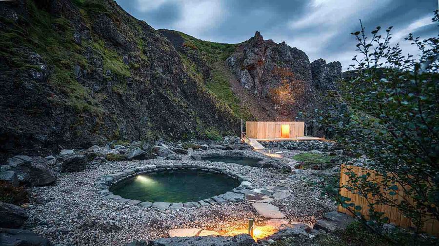 view of a geothermal bath in the evening 
