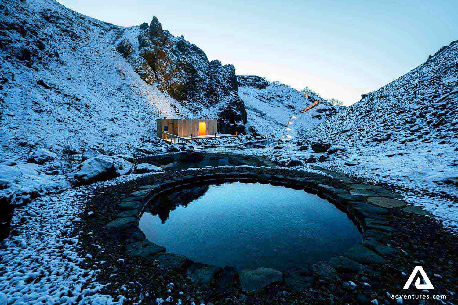 canyon geothermal hot tub in husafell