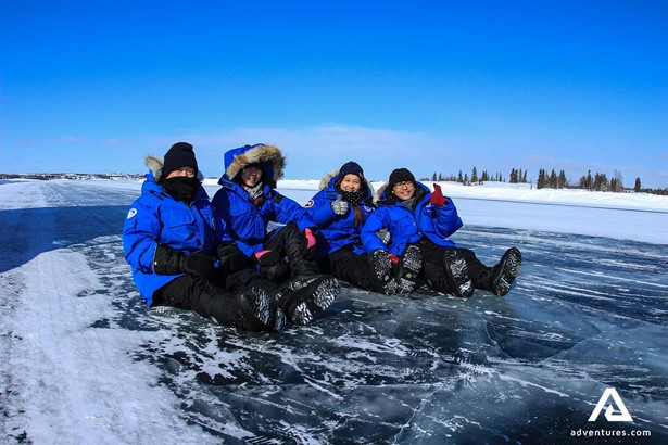 group of people on the ice in yellowknife