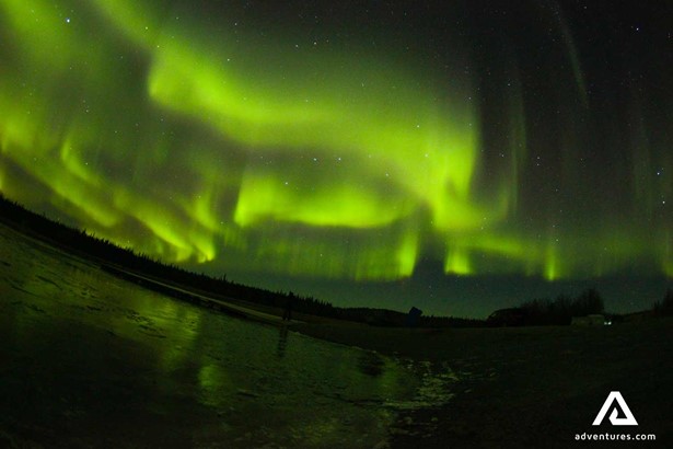 bright green aurora borealis in the sky