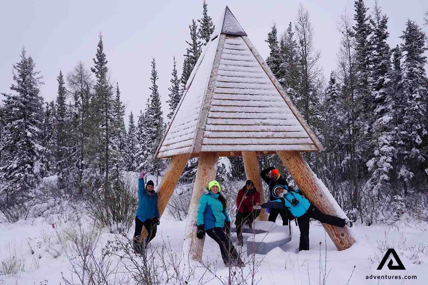 group of hikers resting in winter