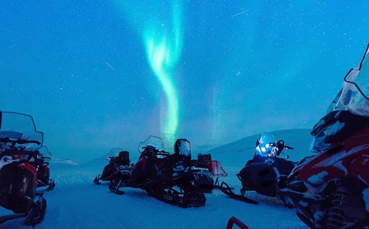 Northern Lights Hunt on Snowmobile with BBQ 