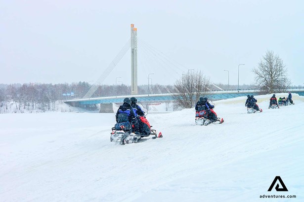 Snowmobiling  Rovaniemi Bridge in Winter