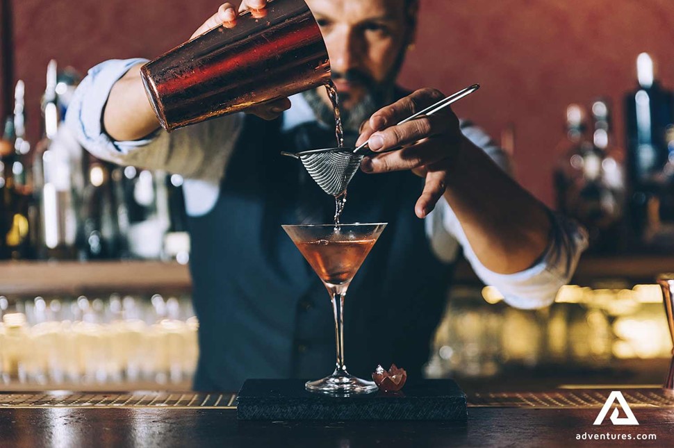 Bartender Making a Cocktail at a bar