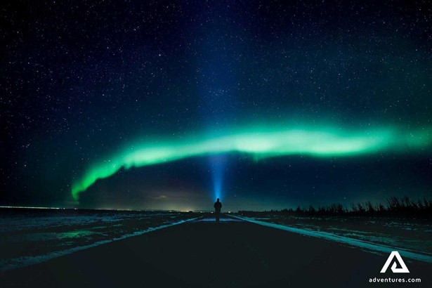 person watching northern lights in canada